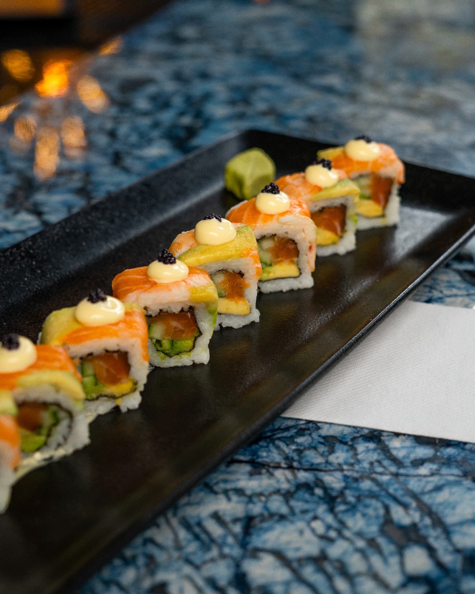 Salmon and avocado sushi rolls at Jozi Gin